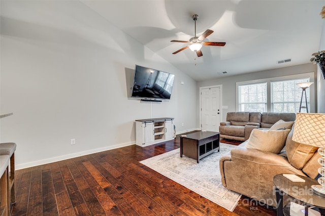 living room with ceiling fan, dark hardwood / wood-style flooring, and vaulted ceiling