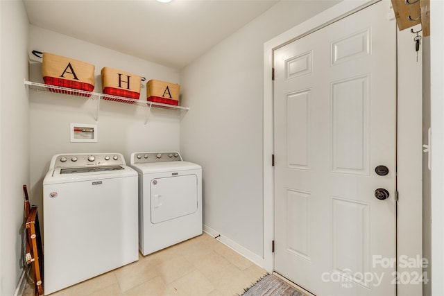 laundry area with washer and dryer