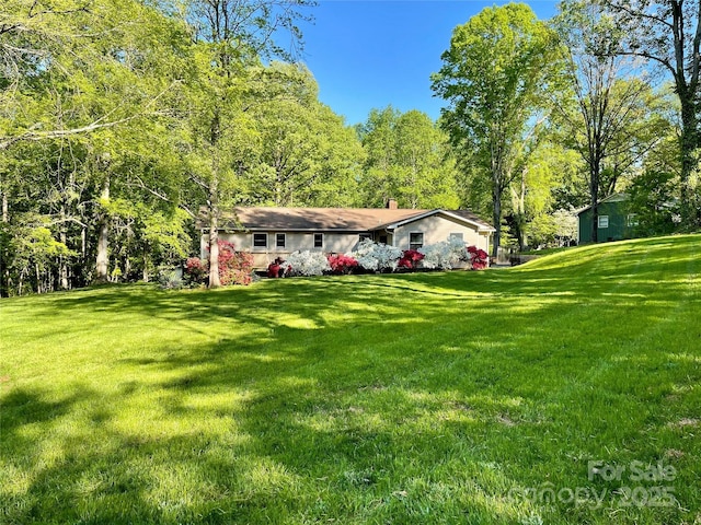 2109 Rock Springs Cir, Denver, NC 28037 - view of front of house featuring a front lawn and a chimney