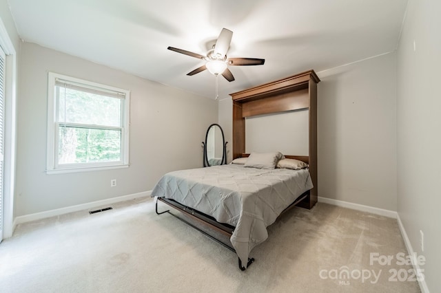2109 Rock Springs Cir, Denver, NC 28037 - bedroom featuring light colored carpet, baseboards, and ceiling fan