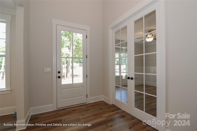 entryway featuring ceiling fan, dark hardwood / wood-style flooring, and french doors