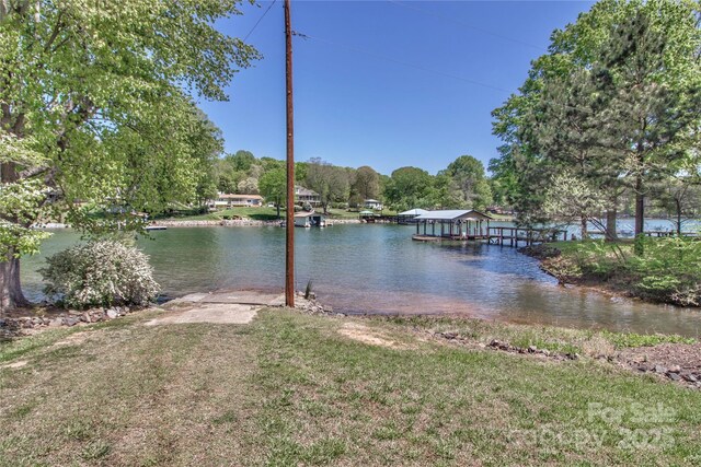 view of water feature with a dock