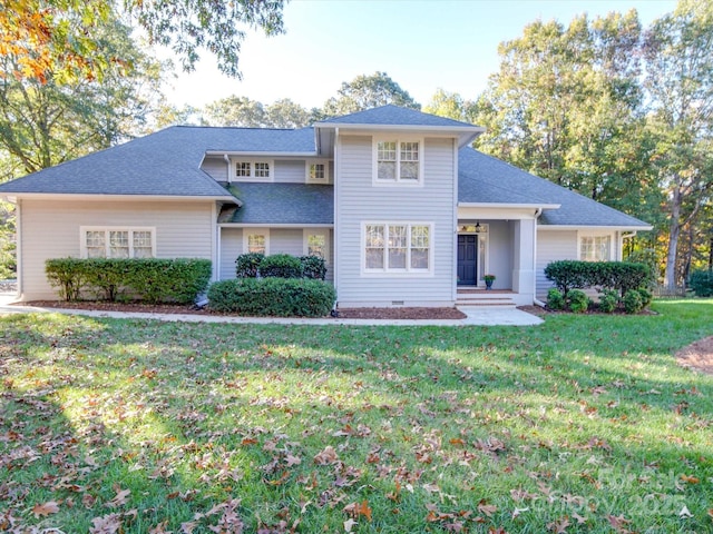 view of front of home featuring crawl space and a front lawn