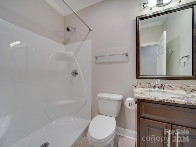 bathroom with tile patterned floors, walk in shower, ornamental molding, vanity, and toilet