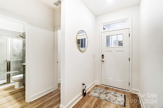 foyer entrance featuring light hardwood / wood-style flooring