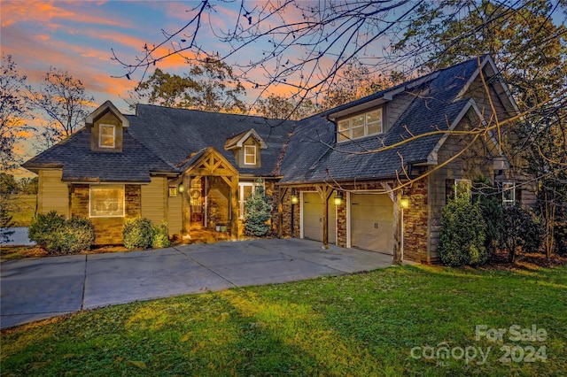 169 Rimmer Farm Rd, Troutman, NC 28166 - view of front facade with concrete driveway, a lawn, and stone siding