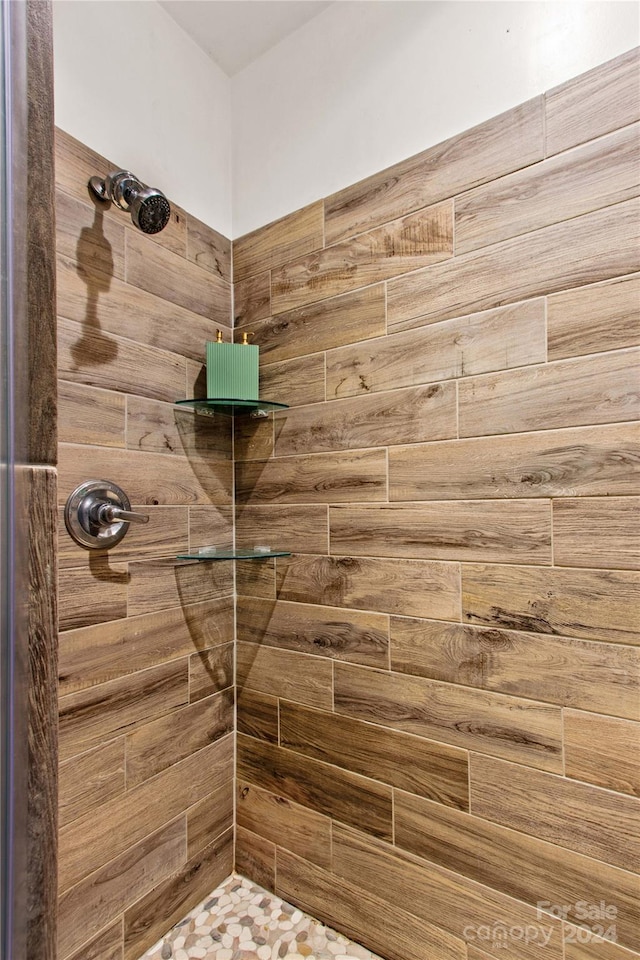 169 Rimmer Farm Rd, Troutman, NC 28166 - full bathroom featuring tiled shower