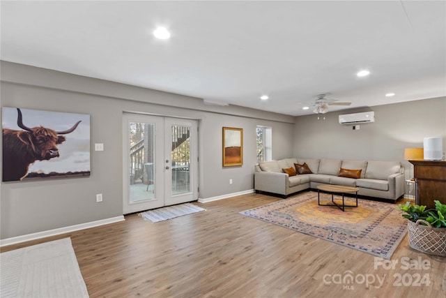 169 Rimmer Farm Rd, Troutman, NC 28166 - living room featuring a wall mounted AC, wood finished floors, baseboards, recessed lighting, and ceiling fan
