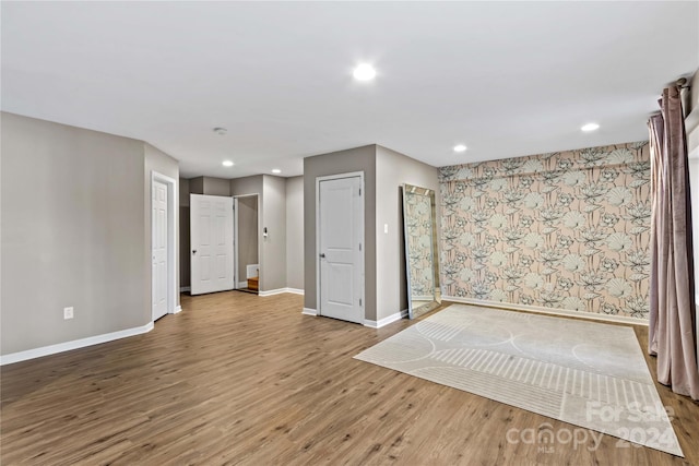 169 Rimmer Farm Rd, Troutman, NC 28166 - empty room featuring baseboards, wood finished floors, and recessed lighting
