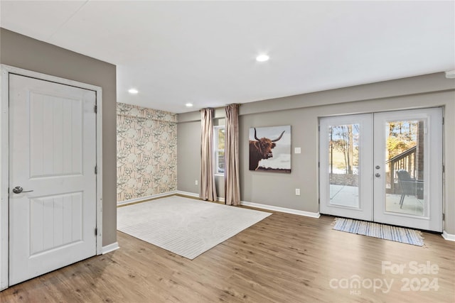 169 Rimmer Farm Rd, Troutman, NC 28166 - entryway with baseboards, wood finished floors, french doors, recessed lighting, and wallpapered walls