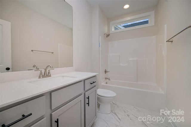 full bathroom with vanity, shower / bathtub combination, and toilet