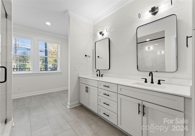 bathroom with tile patterned flooring, vanity, a shower with door, and crown molding