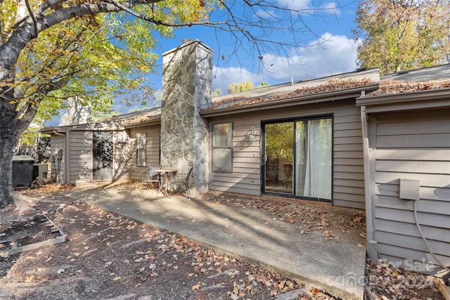 rear view of house featuring a patio