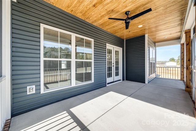 view of patio with ceiling fan and french doors