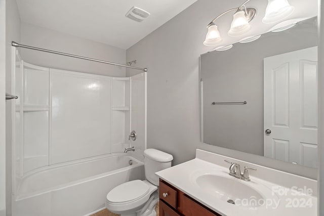 full bathroom featuring shower / tub combination, vanity, and toilet