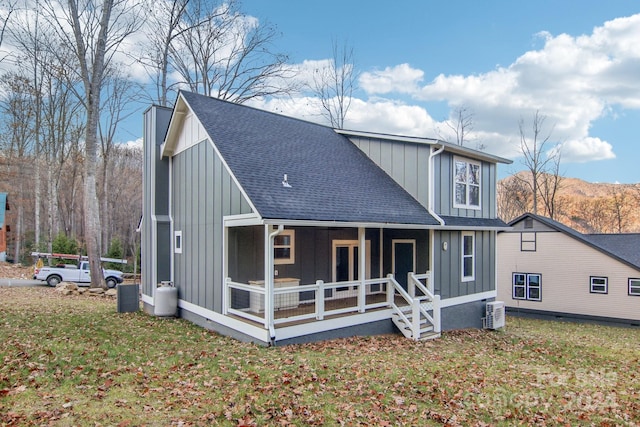 back of house with covered porch