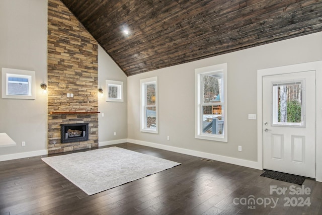 foyer with a healthy amount of sunlight, wood ceiling, dark wood-type flooring, and high vaulted ceiling