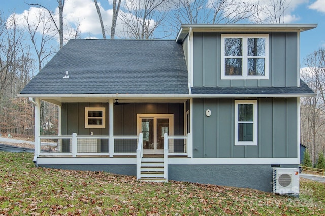 view of front of home with ac unit and a porch