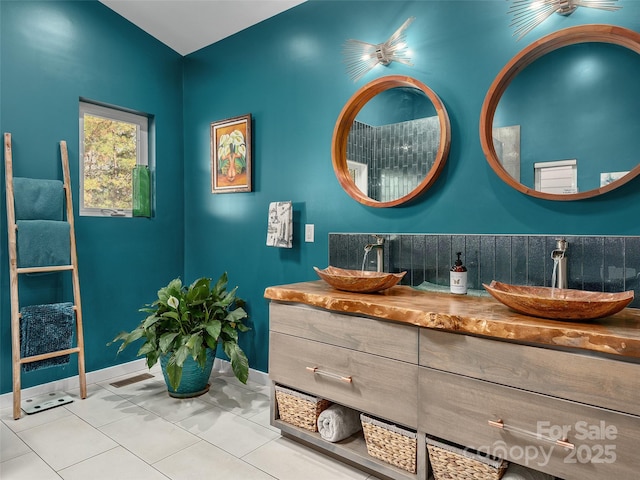 bathroom with vanity and tile patterned floors