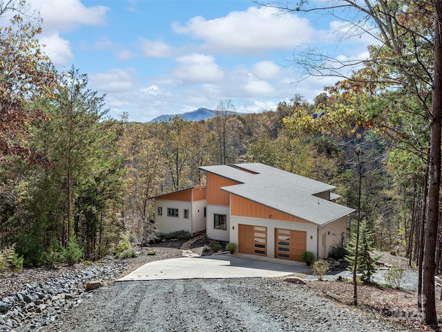 modern home featuring a mountain view