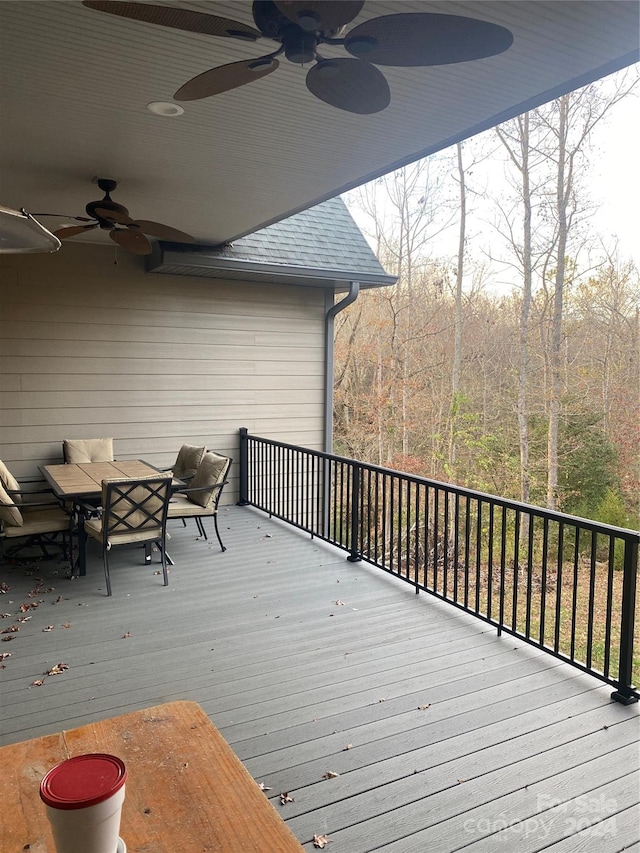 wooden terrace with ceiling fan