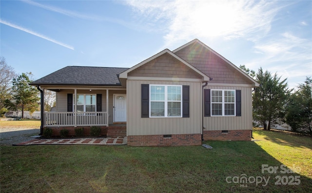 view of front of house with a front yard and covered porch