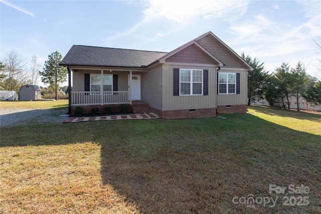 view of front of home featuring a front yard and a porch