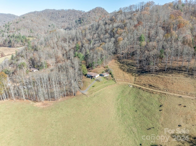 drone / aerial view with a mountain view and a rural view