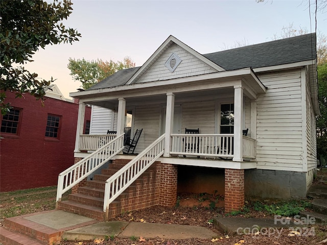 bungalow-style home with covered porch