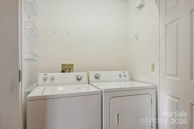 washroom with washer and clothes dryer