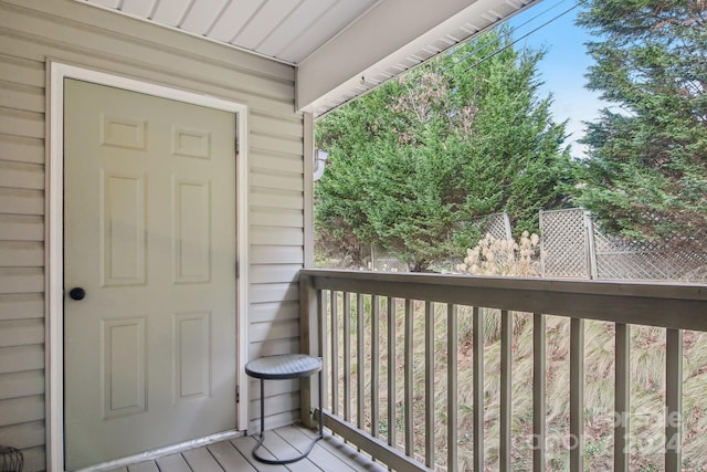 doorway to property featuring a balcony