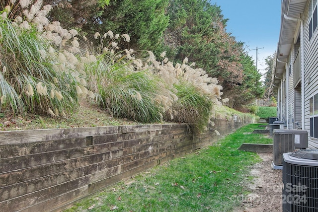 view of yard with central AC