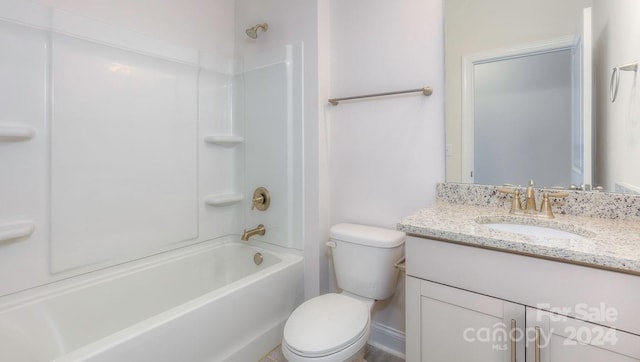 full bathroom with vanity, bathing tub / shower combination, and toilet