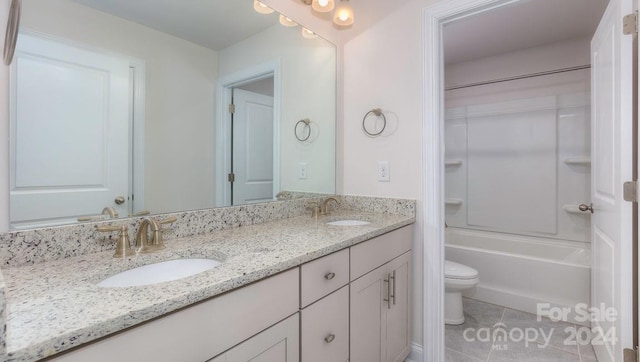 full bathroom featuring shower / bathing tub combination, tile patterned flooring, vanity, and toilet