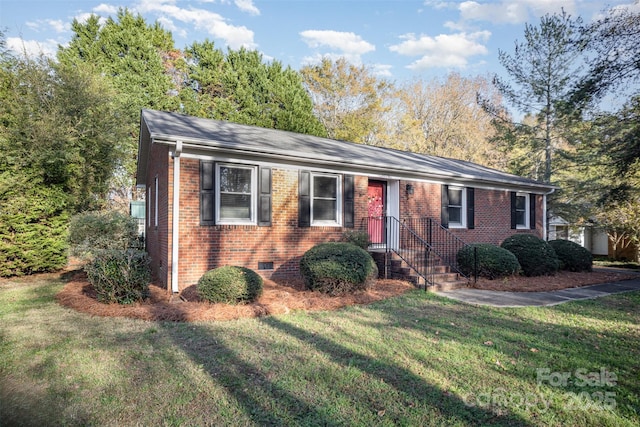 single story home with a front yard