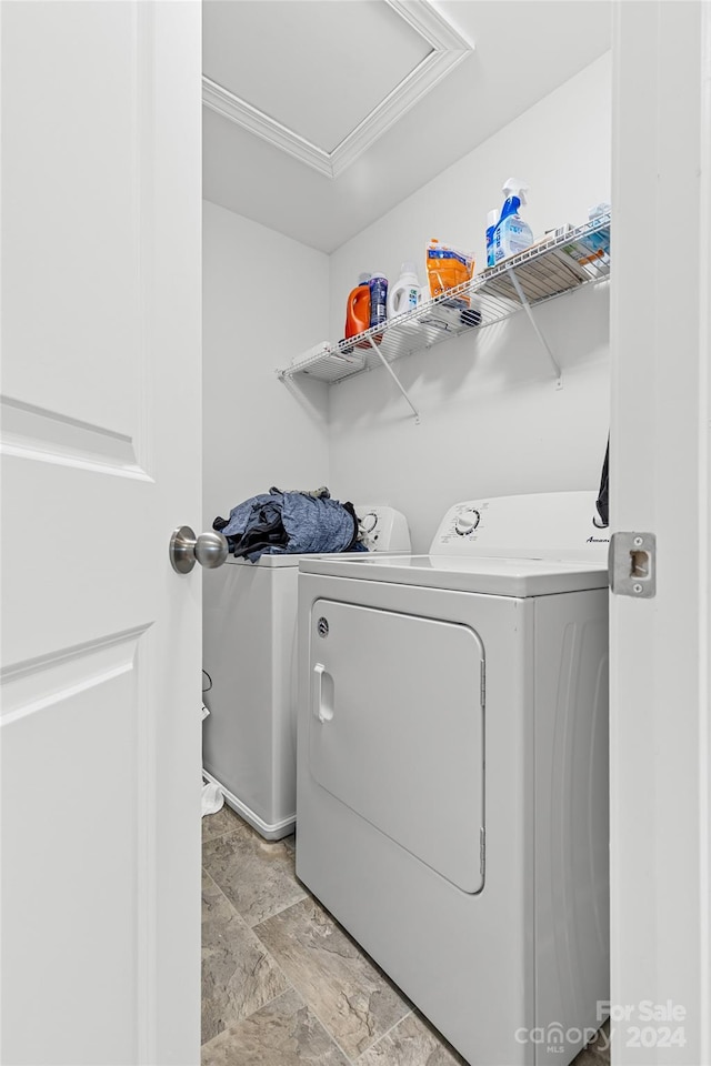 laundry area with independent washer and dryer