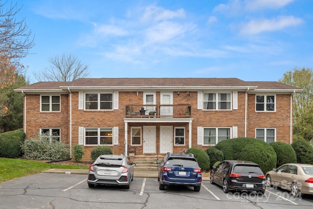 view of front of home with a balcony