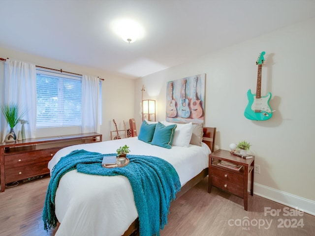 bedroom featuring hardwood / wood-style floors