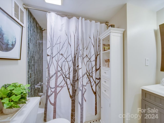 bathroom with vanity and shower / tub combo with curtain