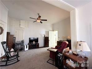 living room with carpet floors and ceiling fan