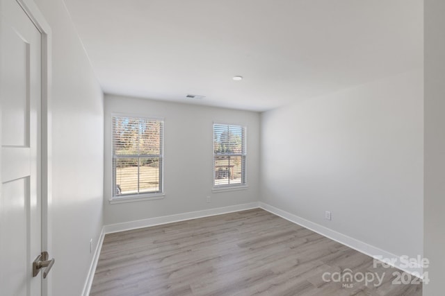 empty room featuring light hardwood / wood-style floors