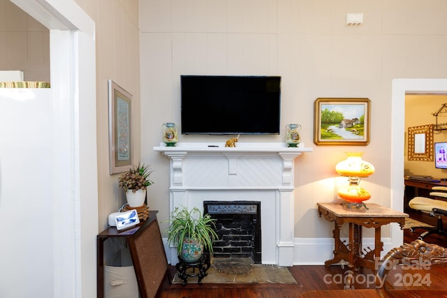 living room with dark hardwood / wood-style floors