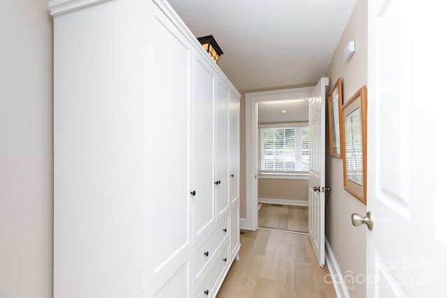 hall featuring light wood-type flooring