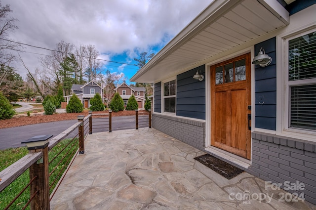 entrance to property with a porch