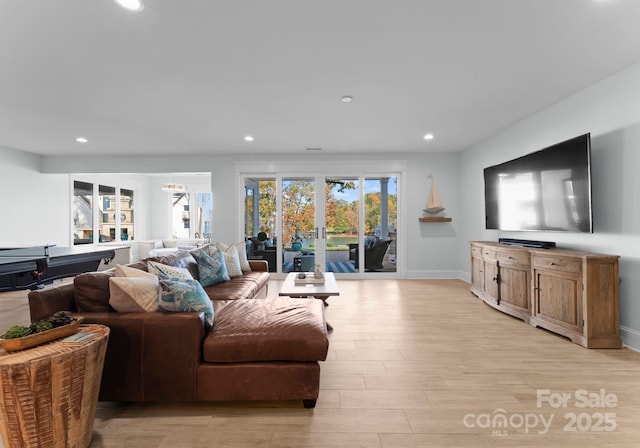 living room featuring light wood-type flooring