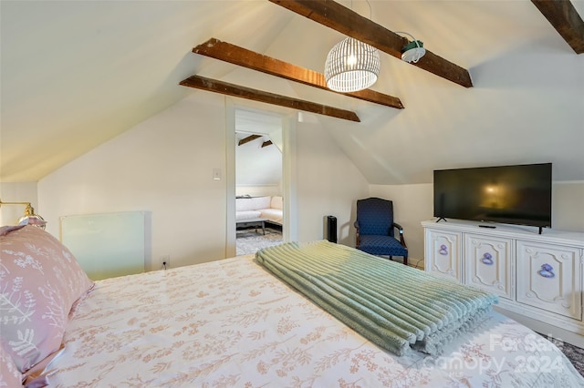 bedroom with lofted ceiling with beams