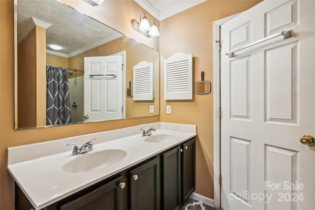 bathroom with crown molding, vanity, a textured ceiling, and a shower with shower curtain