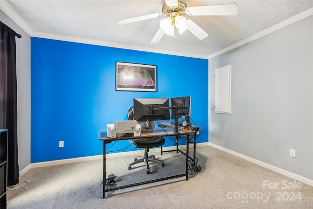 home office featuring ceiling fan, light carpet, a textured ceiling, and ornamental molding