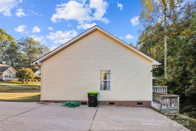 view of property exterior featuring a patio