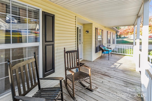 wooden terrace with covered porch